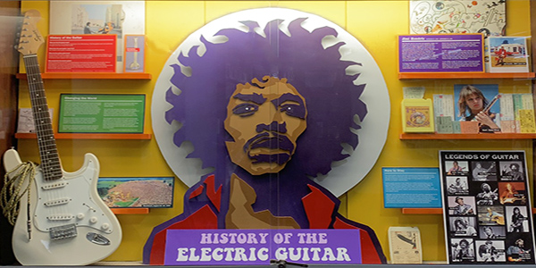 lobby display case, guitar, electric guitar, history