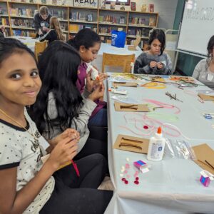 Group of young girls making crafts