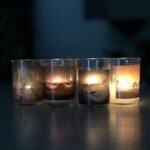 Small candle votives with gray and white spooky, cloudy images