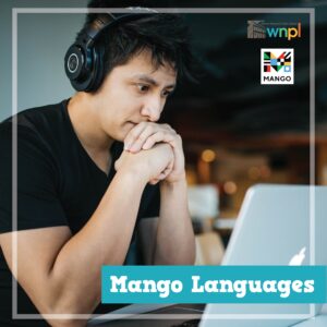 Man focusing on computer with headphones on. Mango Languages ad.