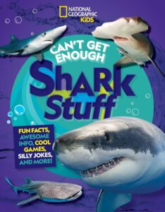 4 different sharks against purple background