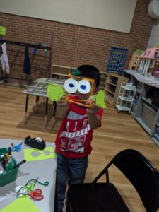 Library staff visit during Gurnee Park Districts after school program where children are making crafts.