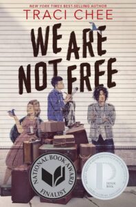Image of book cover for, We are not free by Traci Chee. Three asian teenagers are drawn on a wall to look as if they are interacting with a pile of vintage suitcases.