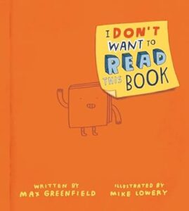 The cover of “I don’t want to read this book” by Max Greenfield. A cartoon doodle of a book with a face and arms lays against an orange background. The title of the book is drawn to look as if it is written on a Post-it note. 