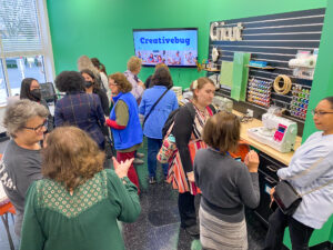 Group of people in the library's makerspace, The Workshop