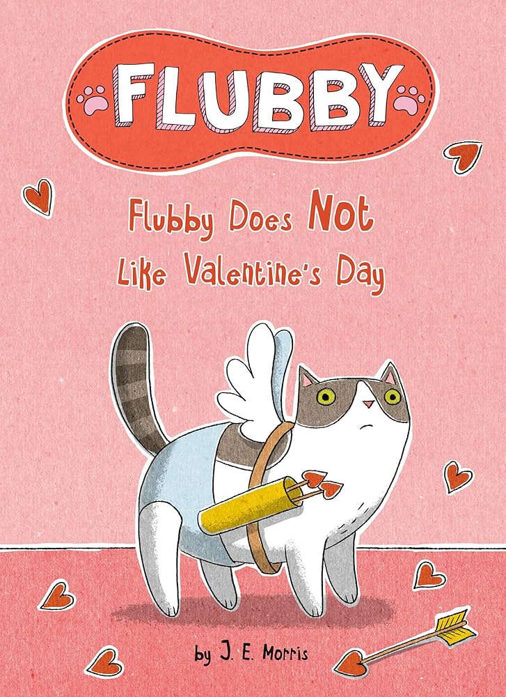 The cover for Flubby does not like Valentine’s Day. The cover features Flubby, a brown tabby cat, dressed as Cupid with small white wings and a bow.