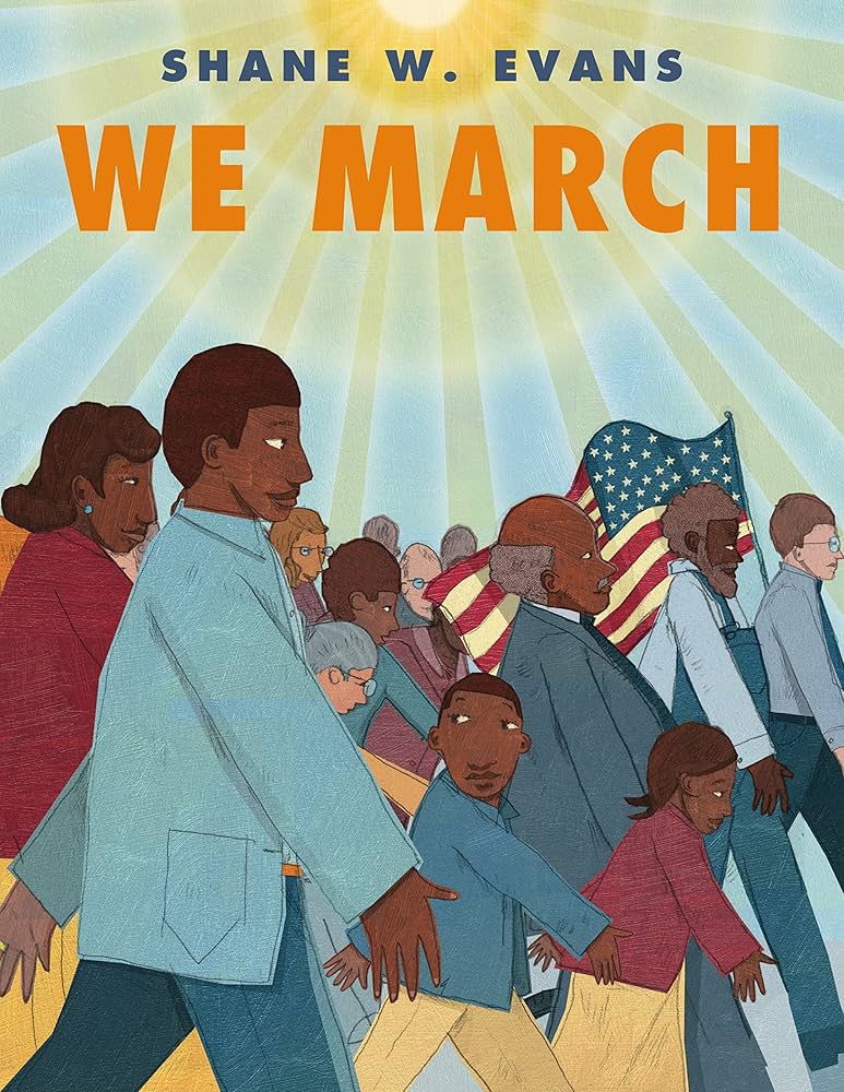 An image of the book cover for “We March” by Shane Evans. A drawn group of diverse people march together. An American flag is being held within the crowd. A sun with bright sunbeams shines brightly overhead.