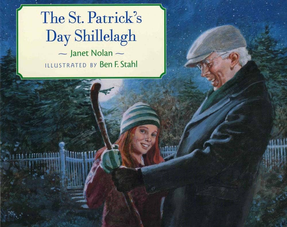 An image of the book cover for “The St. Patrick's Day Shillelagh” by Janet Nolan. A young drawn girl stands with an elderly man outside at night. They are smiling and a cane is being held by each of them with one hand.