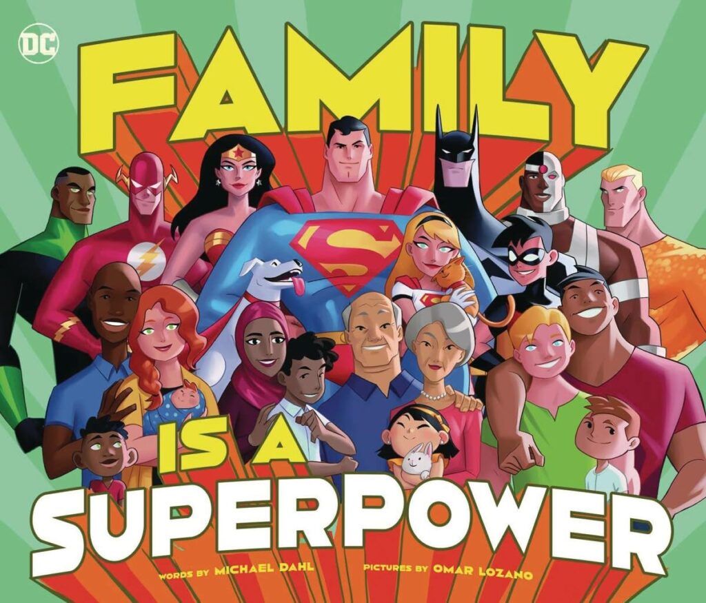 The book cover of Family Is a Superpower features DC superheroes like Superman, Batman, and Wonder Woman standing behind diverse families of all ages. The title is in bold yellow and white letters, with the DC logo in the top left corner.