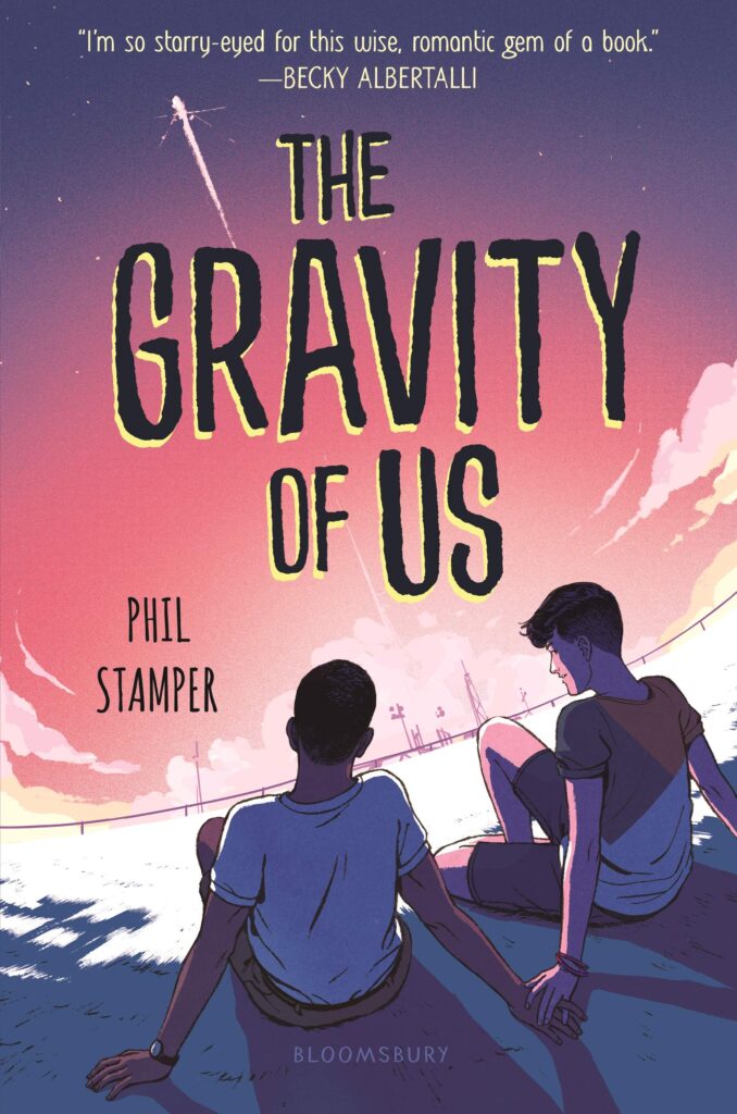 book cover for the gravity of us. two teens sit at the edge of a building facing each other,