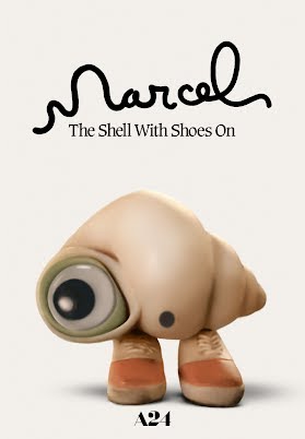 Movie poster for Marcel the Shell with Shoes On, showing a tiny shell with one eye and pink shoes on.