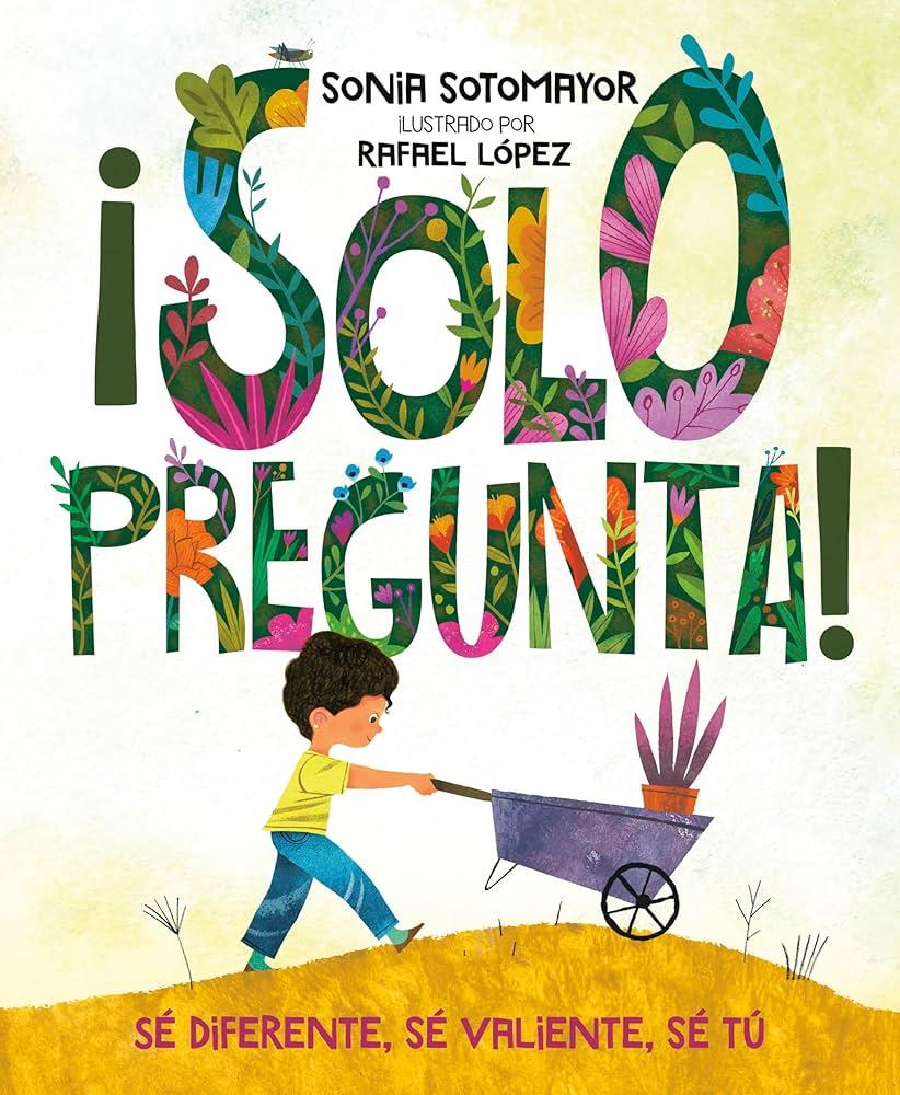 Young boy pushing a wheel barrow with plants.
