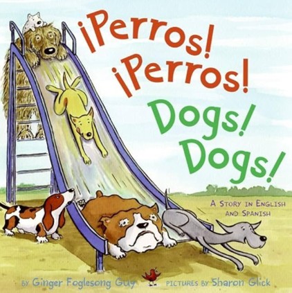 Dogs sliding down a slide.